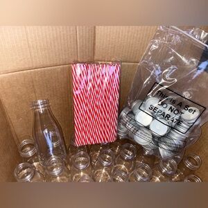 New Plastic Milk Bottles with Lids and red and white straws.